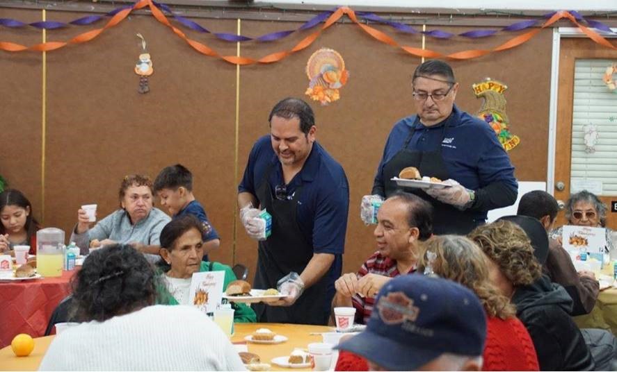 SDG&E employees volunteer to serve holiday meals.