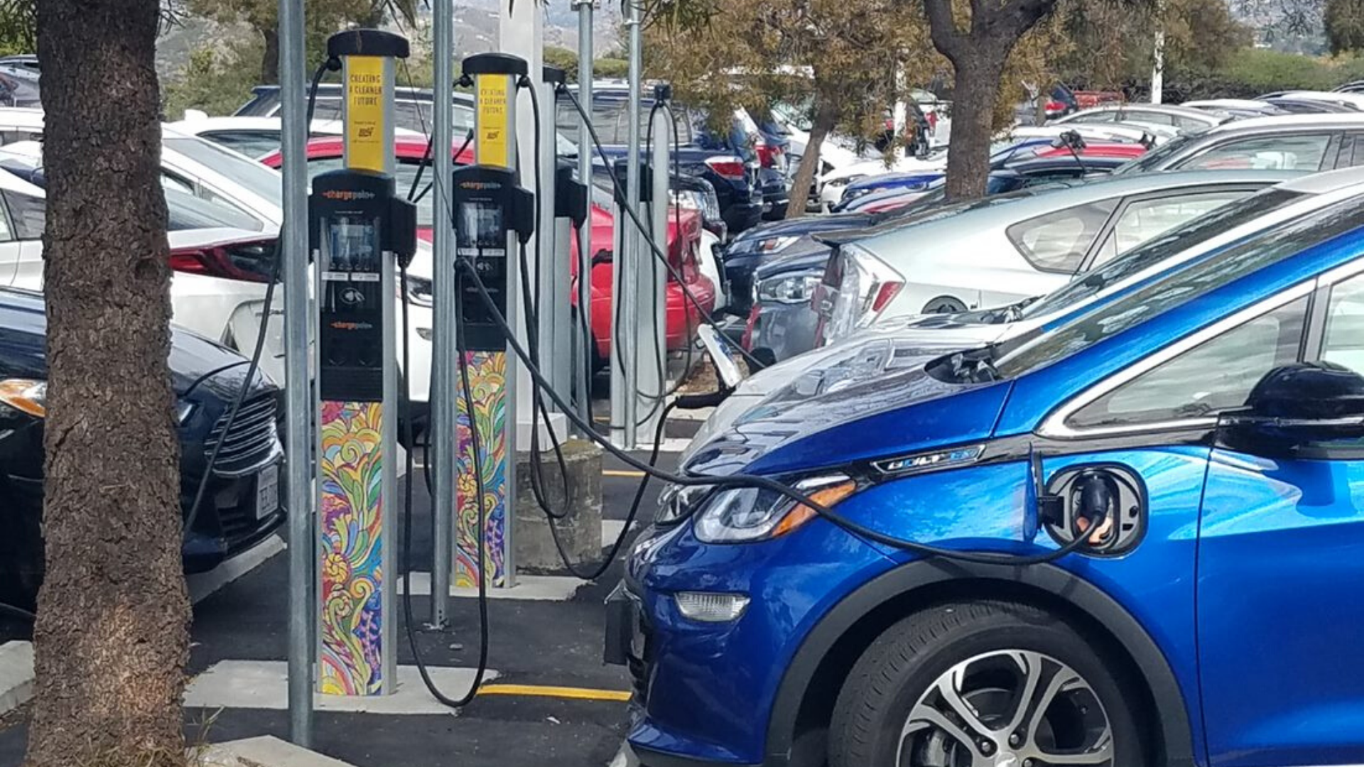 Cars charging at electric vehicle chargers provided by SDG&E.