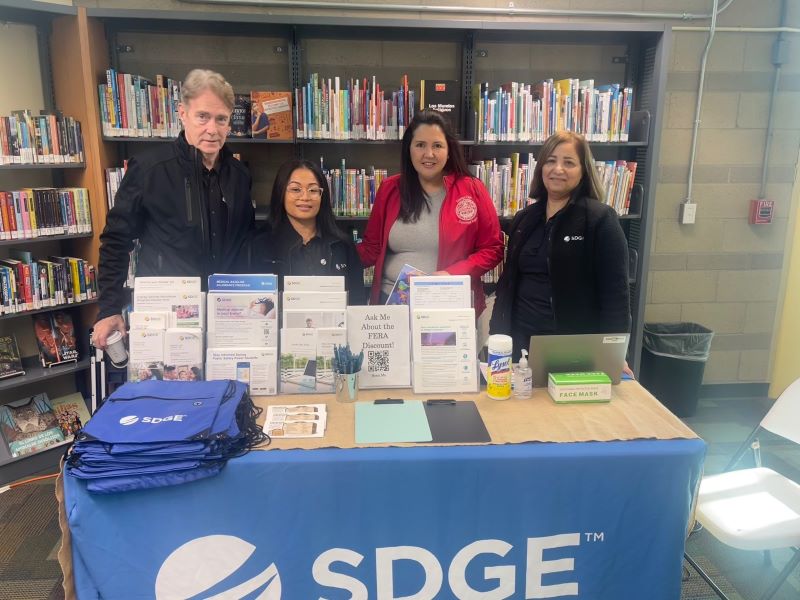 SDG&E team members and San Diego County Board of Supervisors Chair Nora Vargas at the Local Assistance Center in Spring Valley.